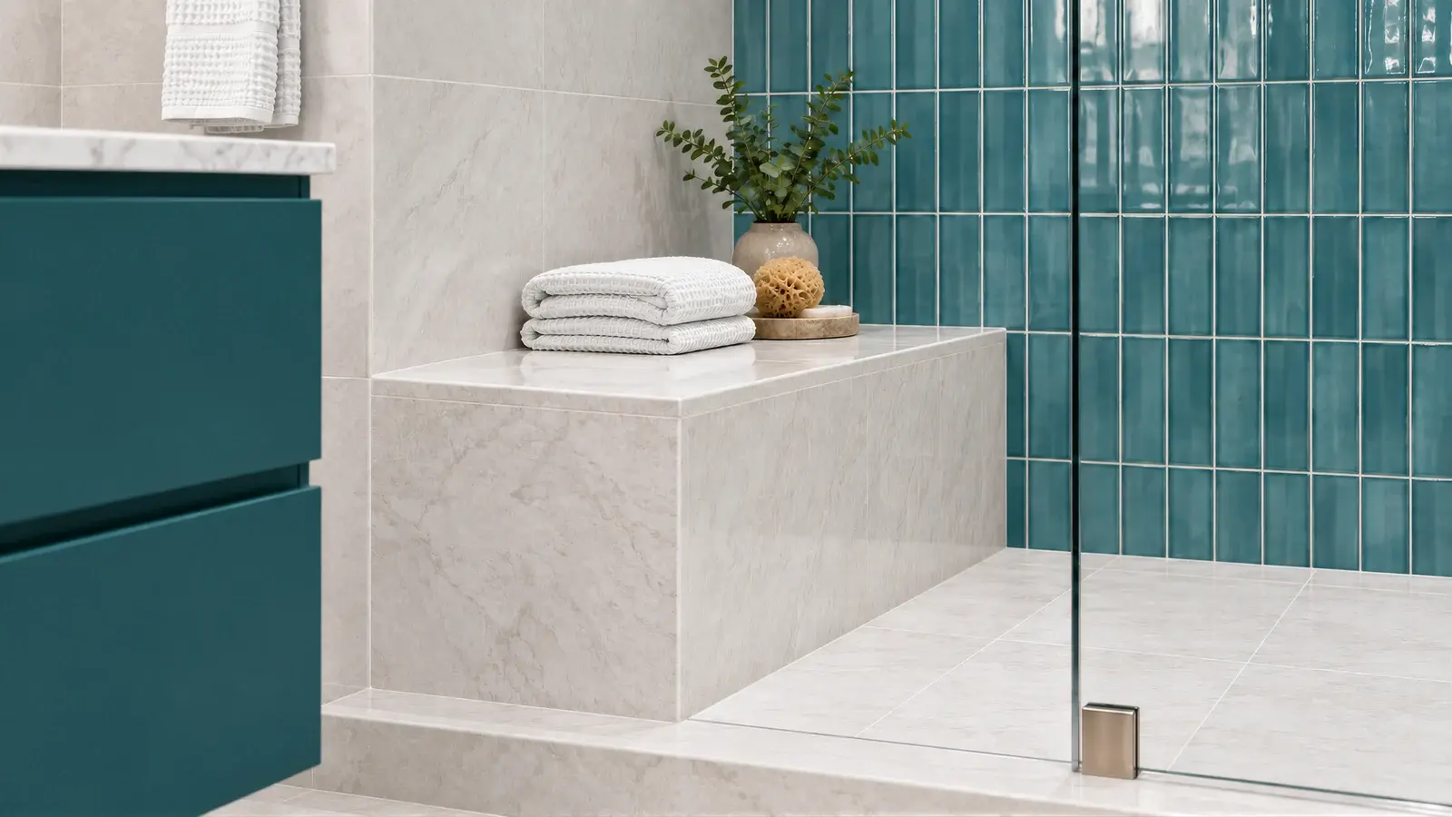 Shower seat and enclosure at The Celadon Suite, Boca Raton condo